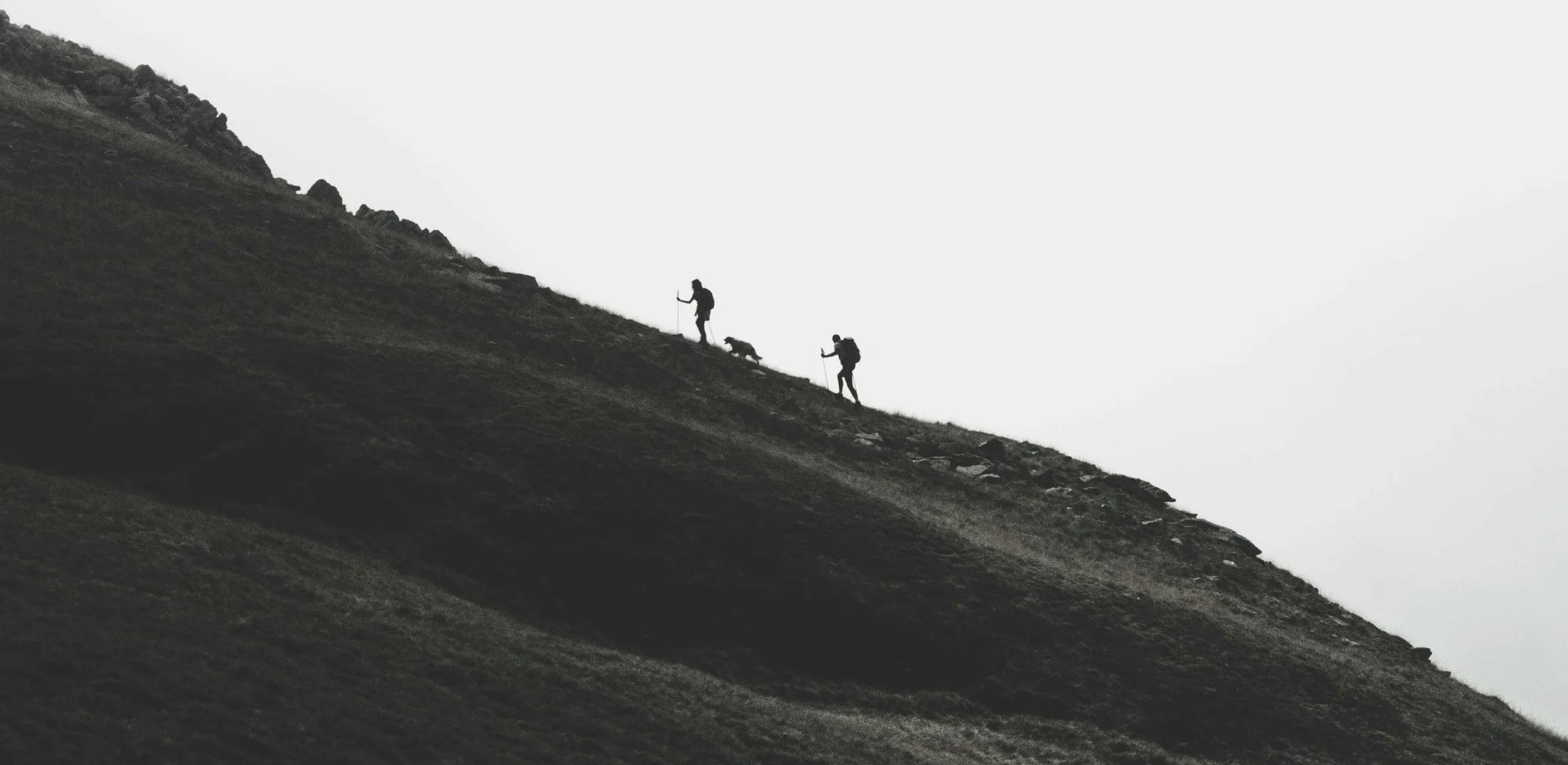 two hikers on a mountain